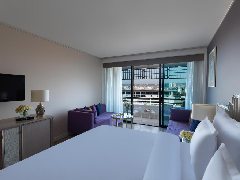 Comfort Double Room with two Sofa beds and city view